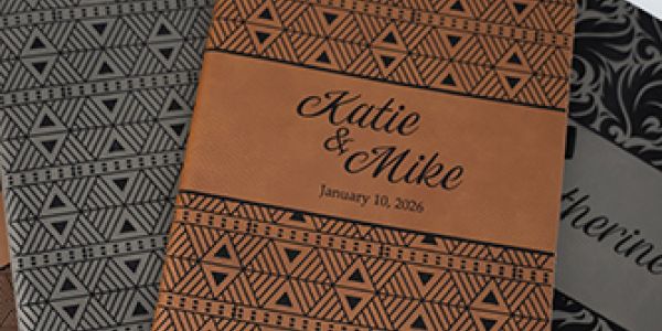 ornately engraved leatherette notebooks