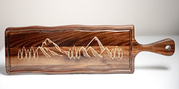 laser engraved cutting board with inlay