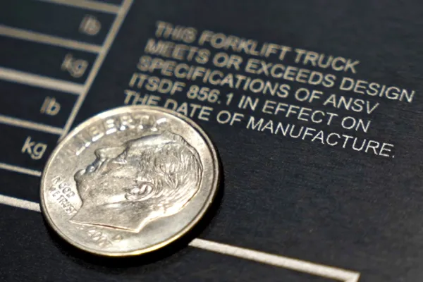 fine detail showing relationship of engraving to a dime